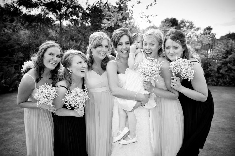 With bridesmaids and flower girl