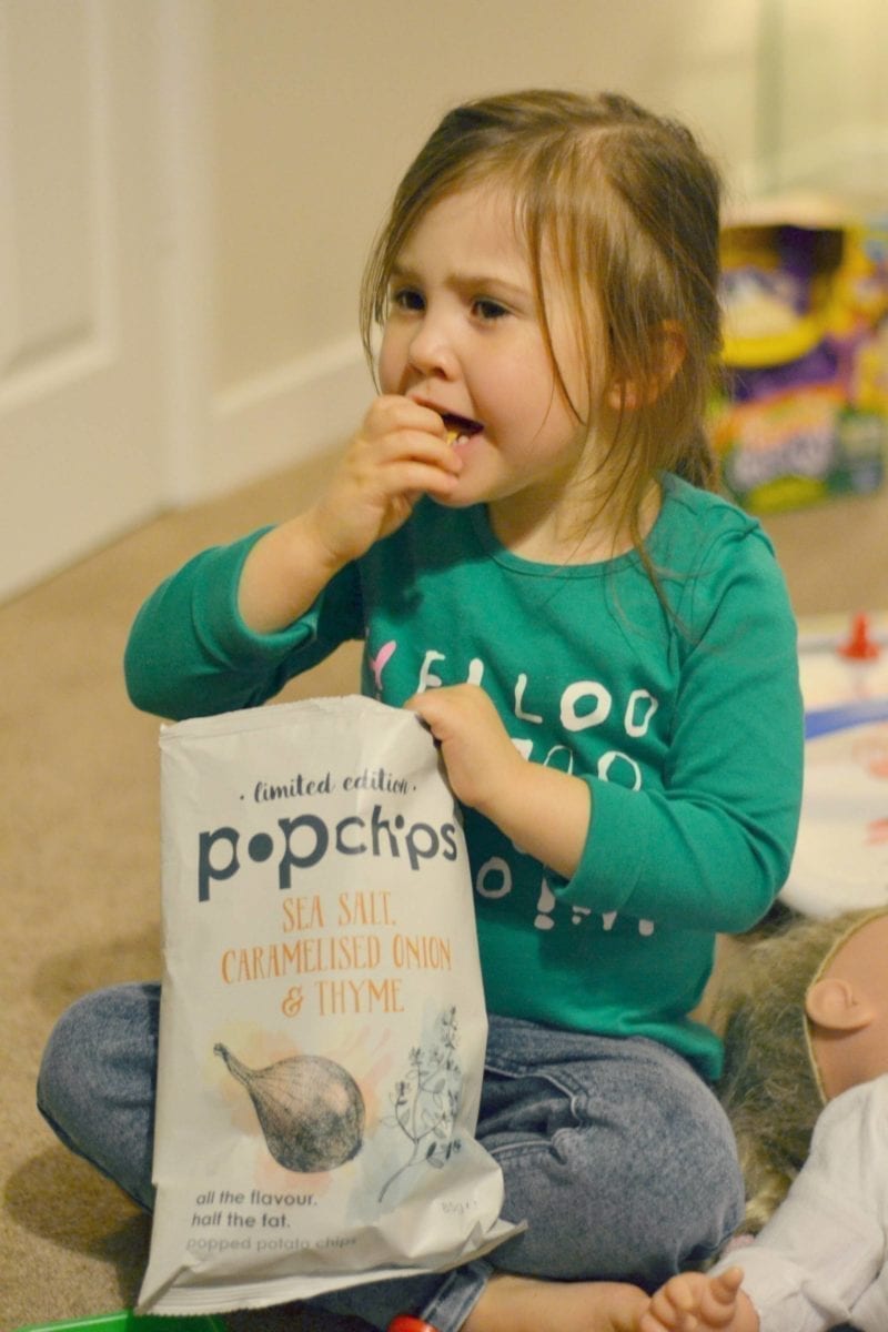 Ava eating Popchips