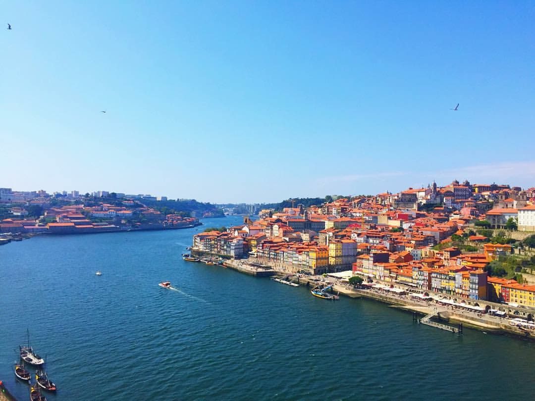 view of blue sky, porto town and river from up high