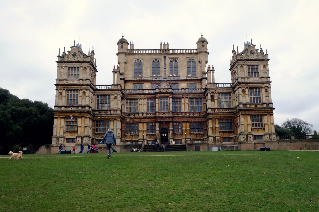 old building at top of grassy hill