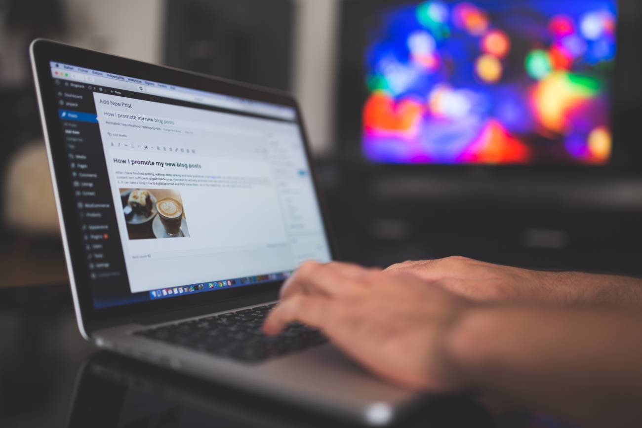 person typing on keyboard