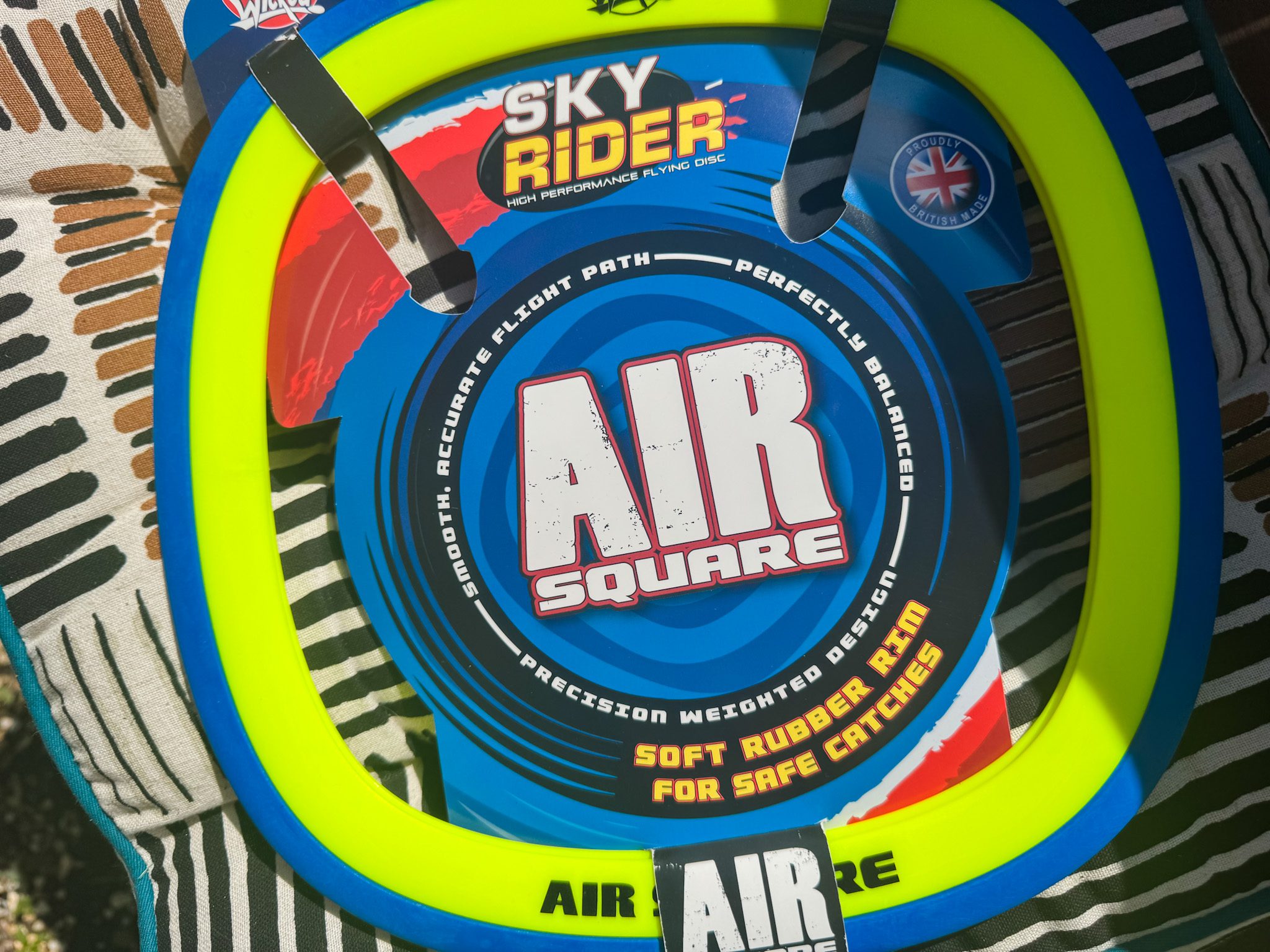 blue and bright yellow sky rider air square frisbees
