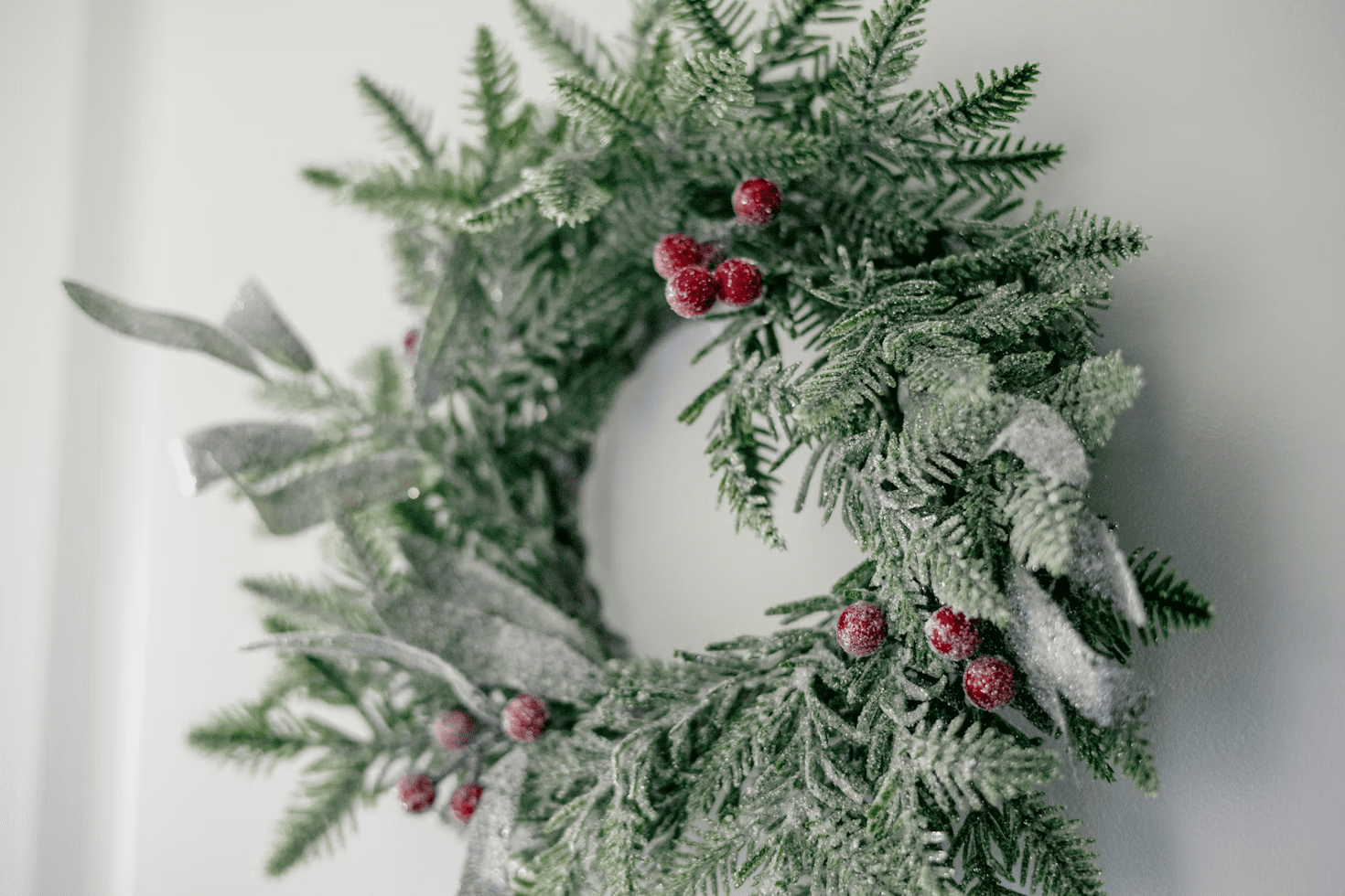 christmas wreath with red berries on