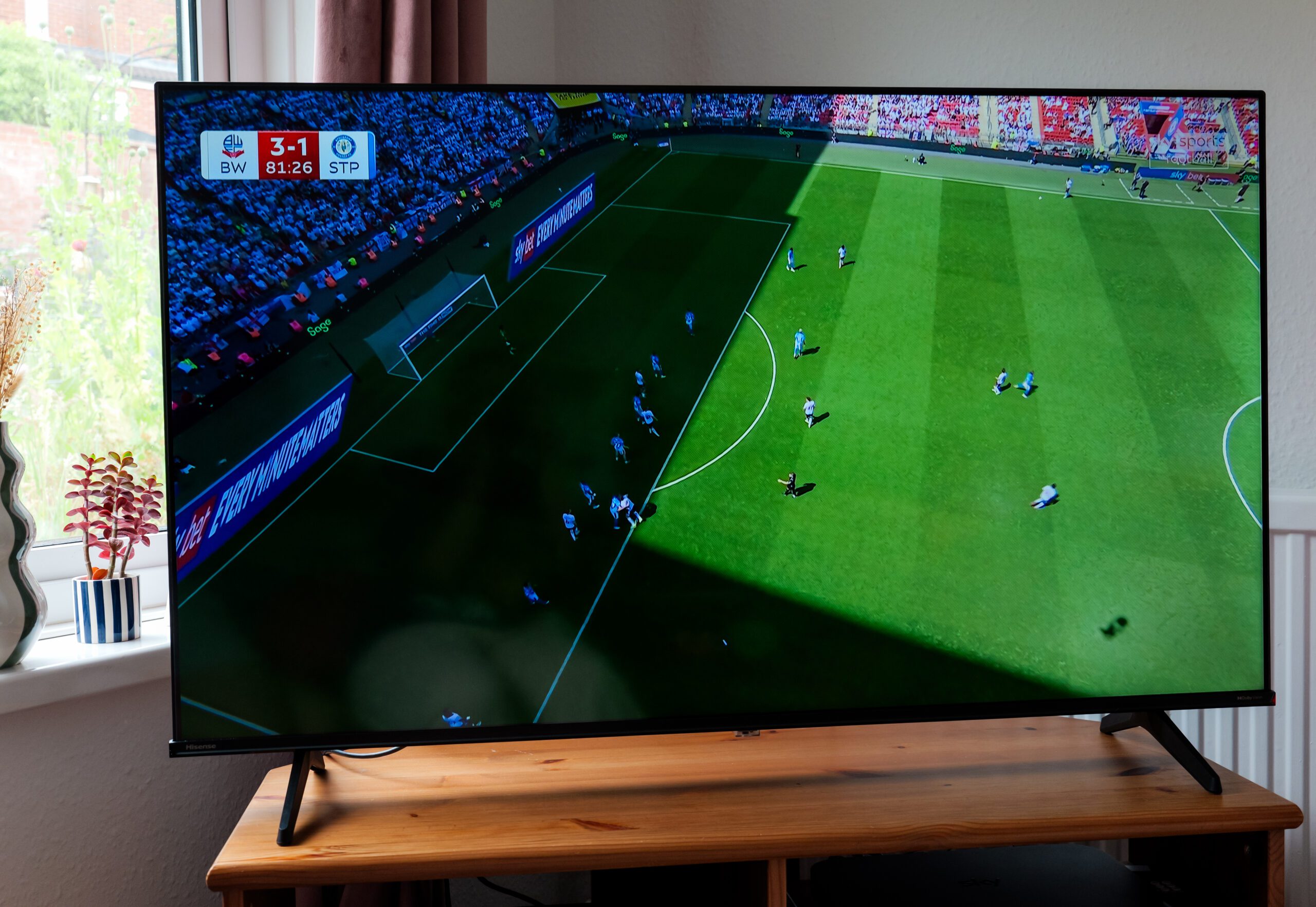 close up of football match on TV